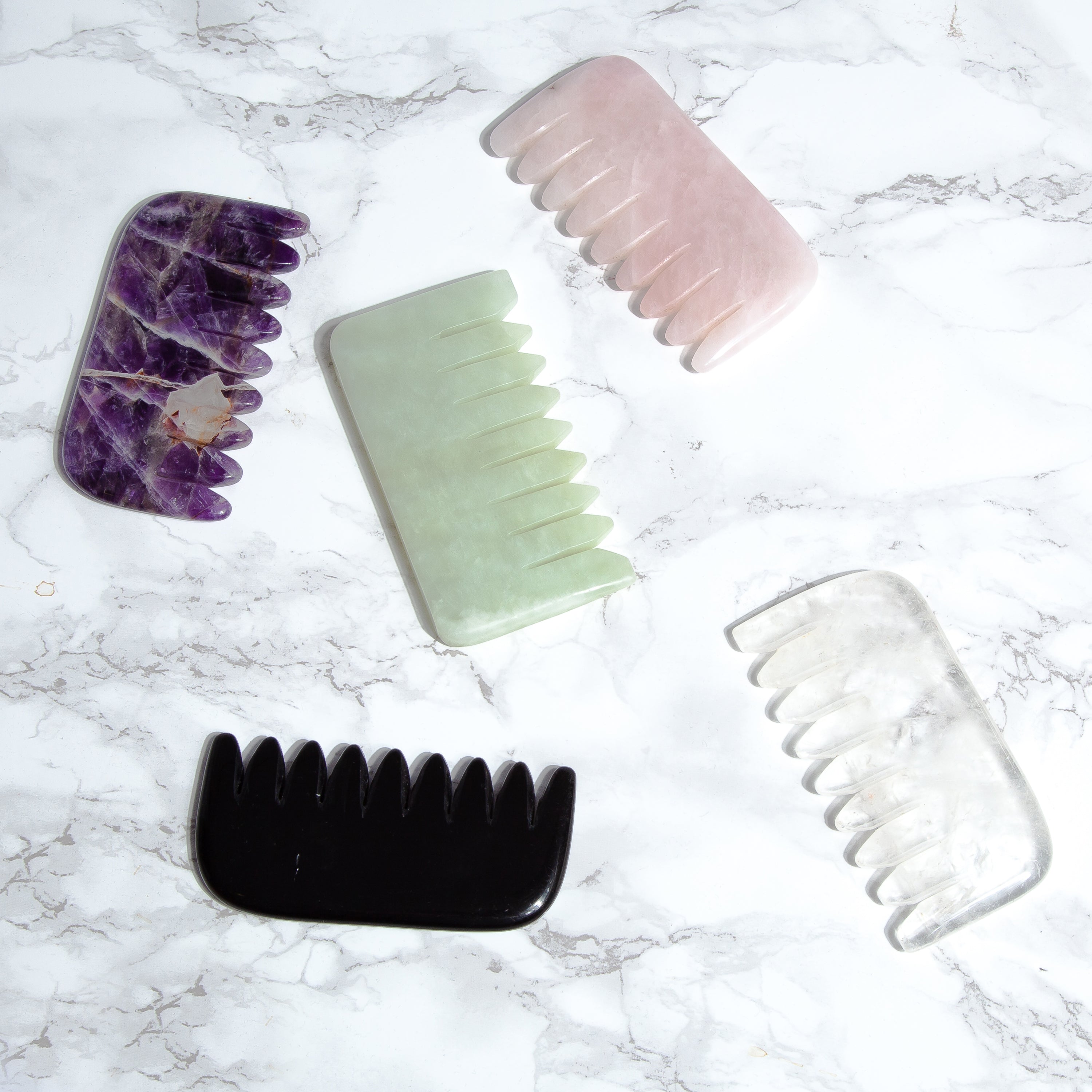 Different Crystal type combs on a marble background